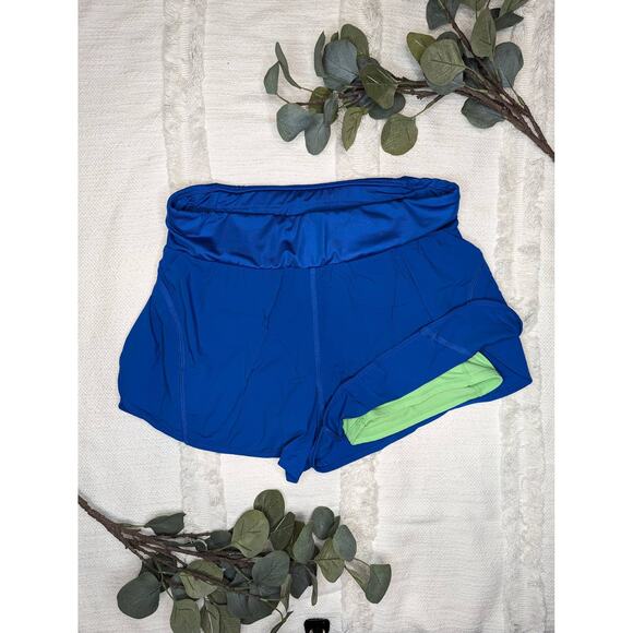 Fabletics Lined Running Shorts in Blue & Green - Picture 1 of 3